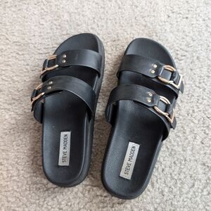 Black slip on sandals